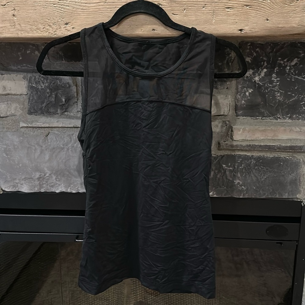 Black mesh tank top. No pilling, great condition!